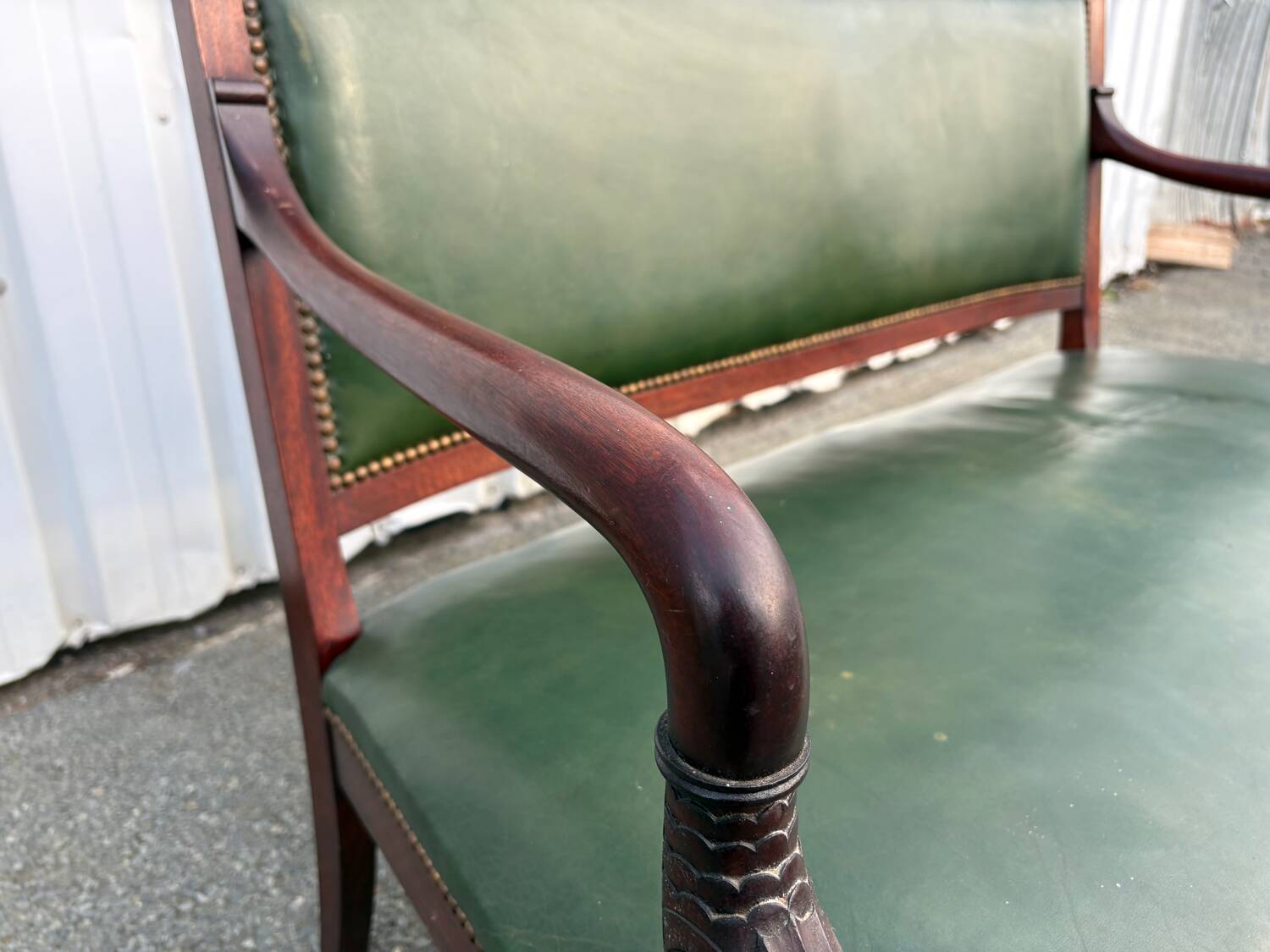Empire style bench in mahogany and green leather