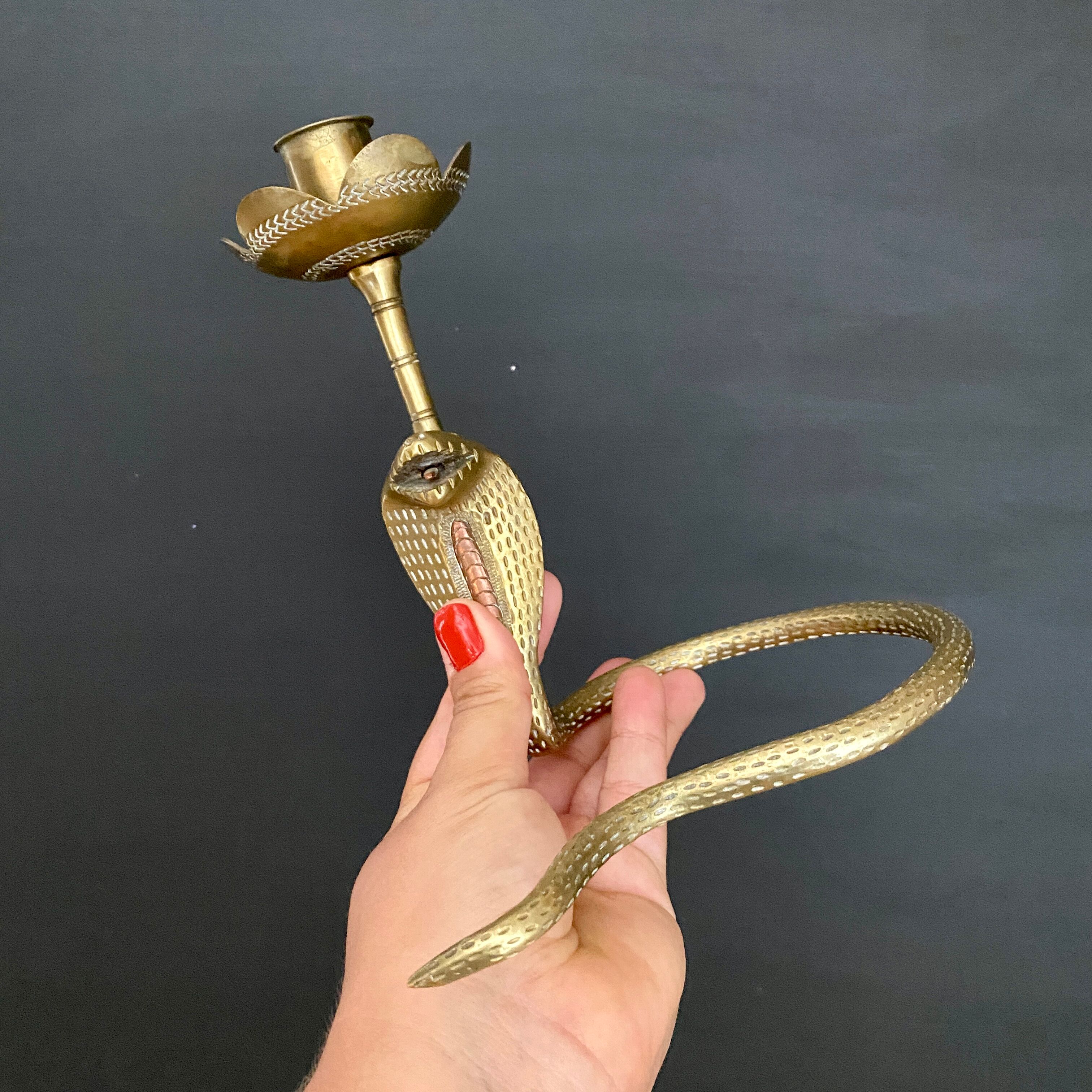 Brass candle holder in the shape of cobra -snake