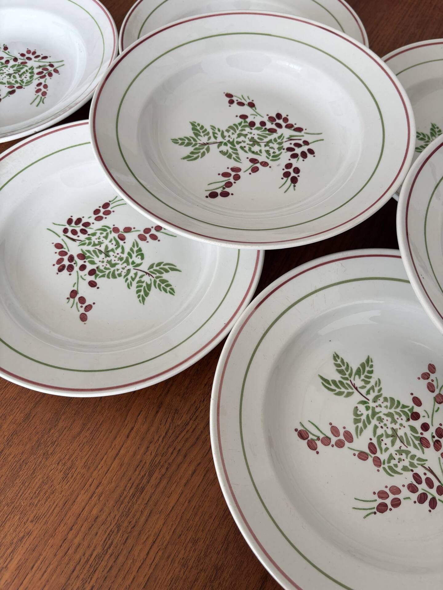 Set of 8 antique deep plates KG Lunéville, floral berry decoration.