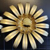 Golden metal flower sconces