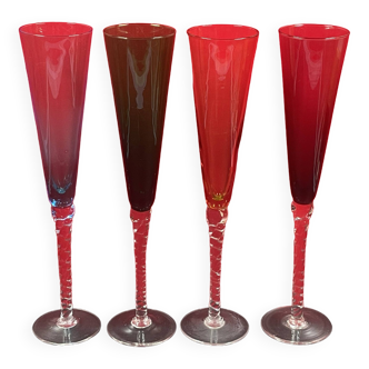 Service de 4 flûtes à champagne en verre multicolore pied torsadé XXe H. 27 cm