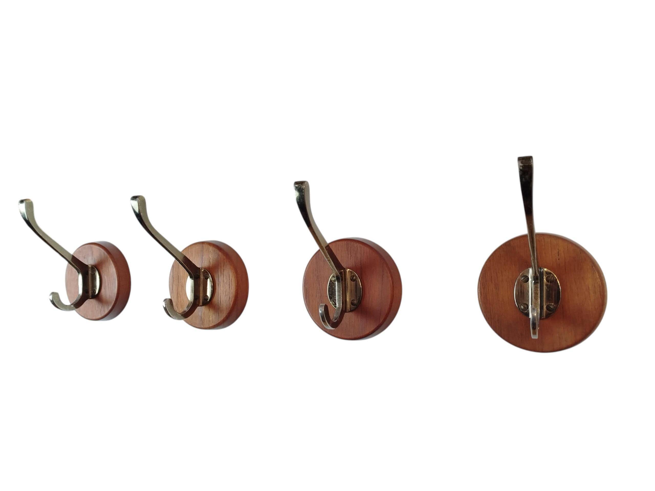 Set of 4 teak and brass coat hooks, Denmark 1960s