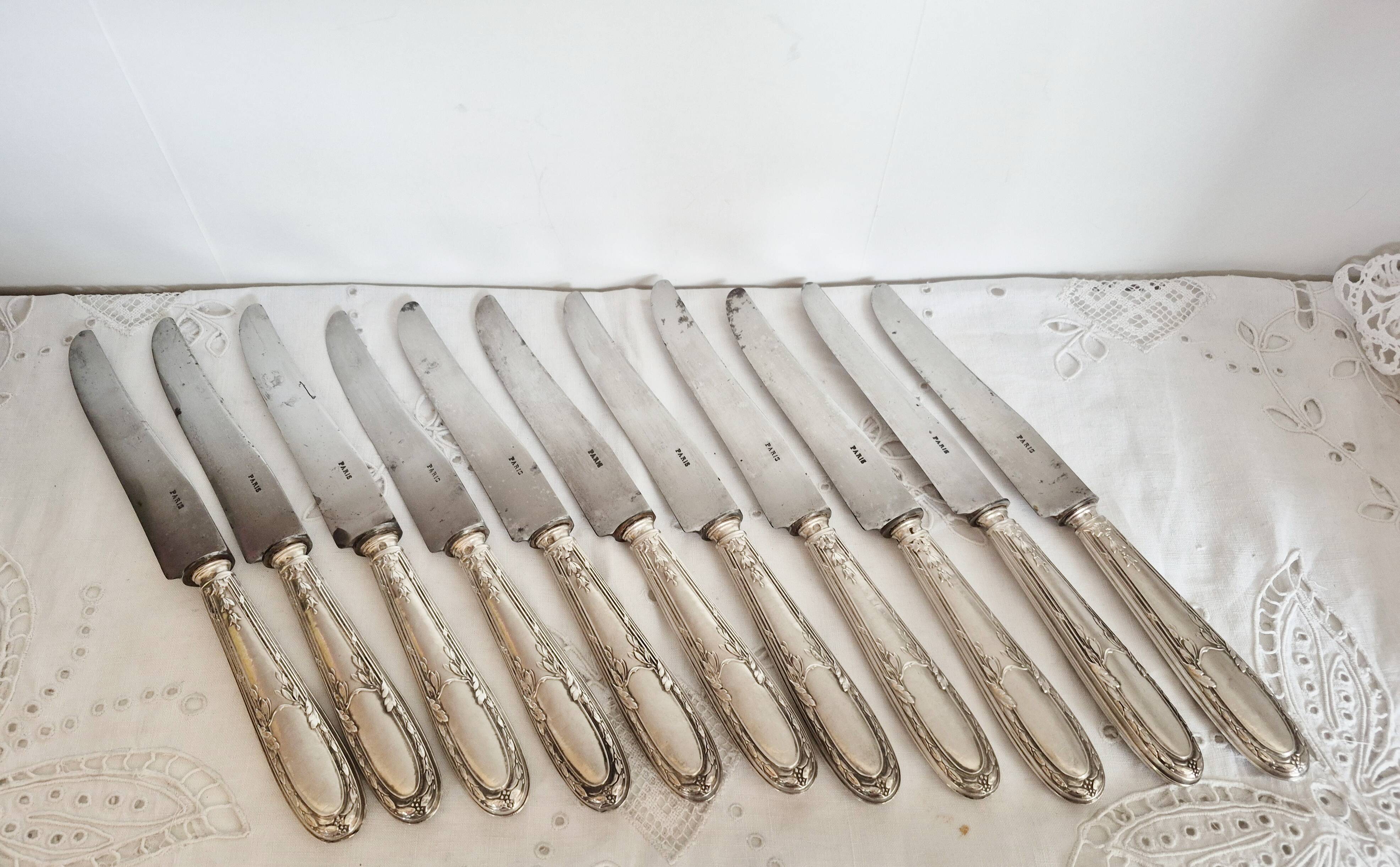 Set of 11 vintage knives, steel blades and silver handles