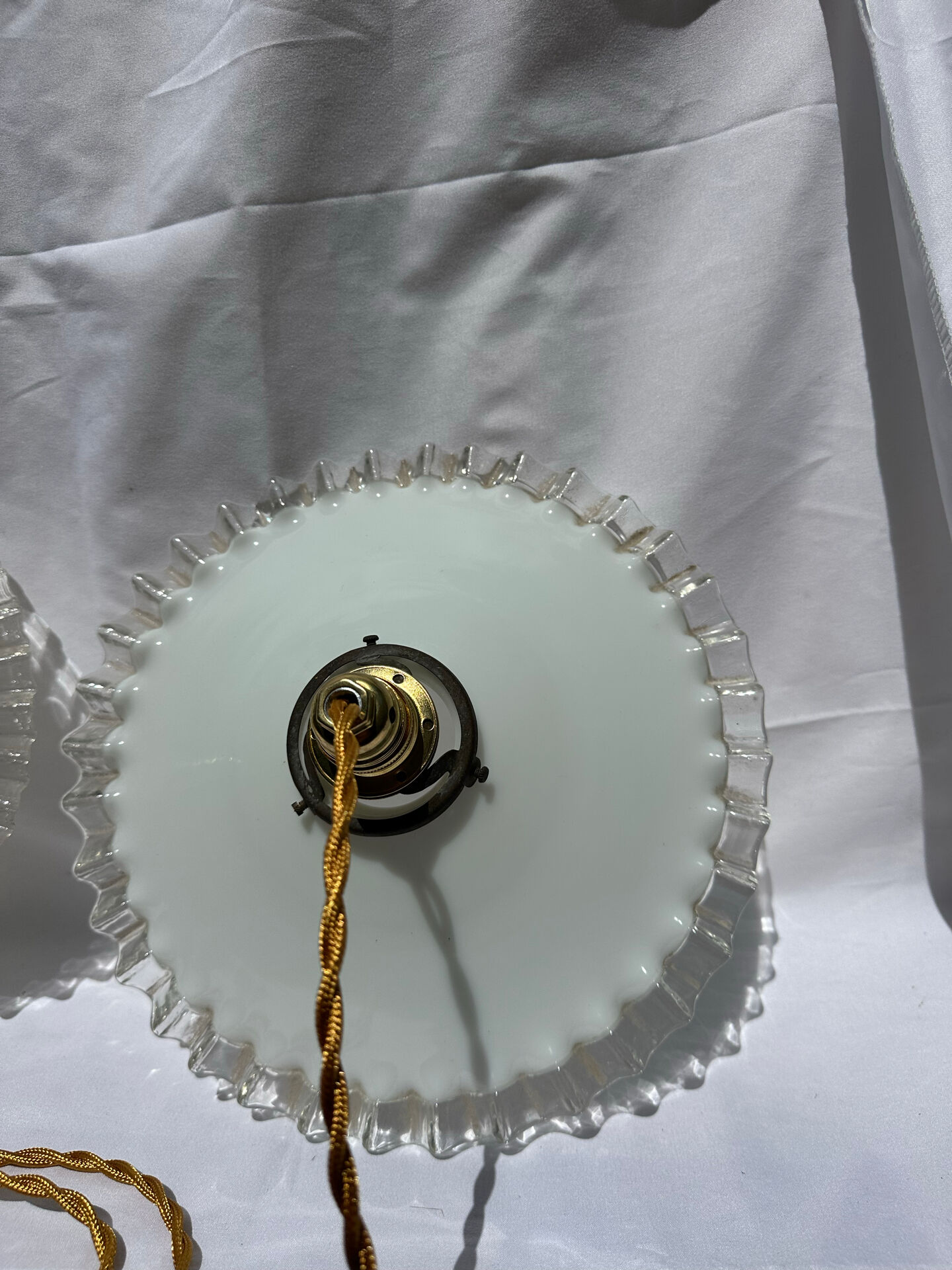 Vintage wavy opaline suspension pair with brass claw