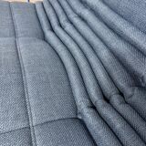 Two-seater sofa reupholstered.