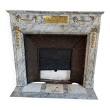 Louis XVI fireplace in veined grey marble with original gilded bronzes from the 19th century.