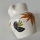 Vintage Marais pottery pitcher with orange floral decoration