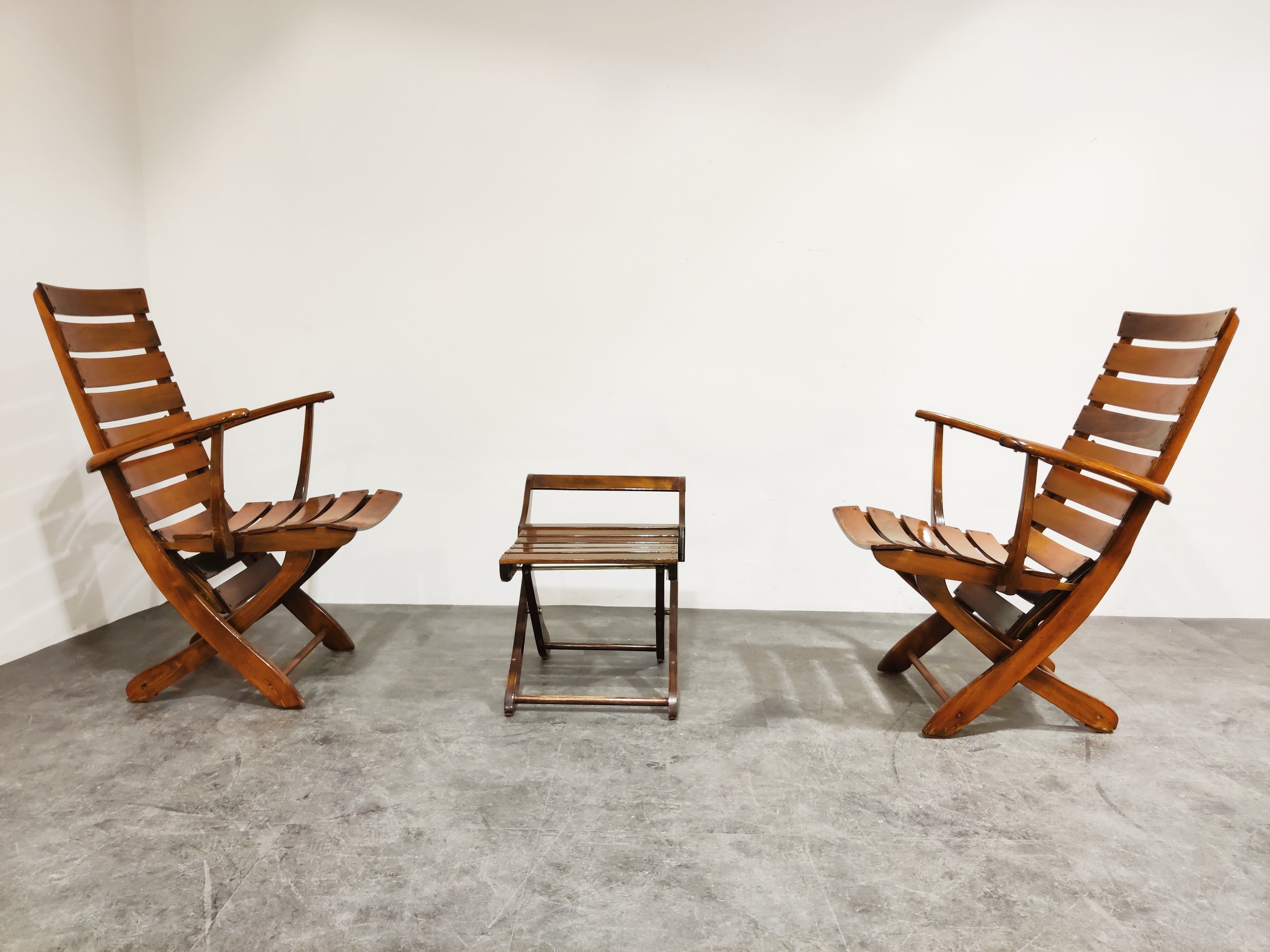 Pair of wooden folding garden chairs with table, 1950s