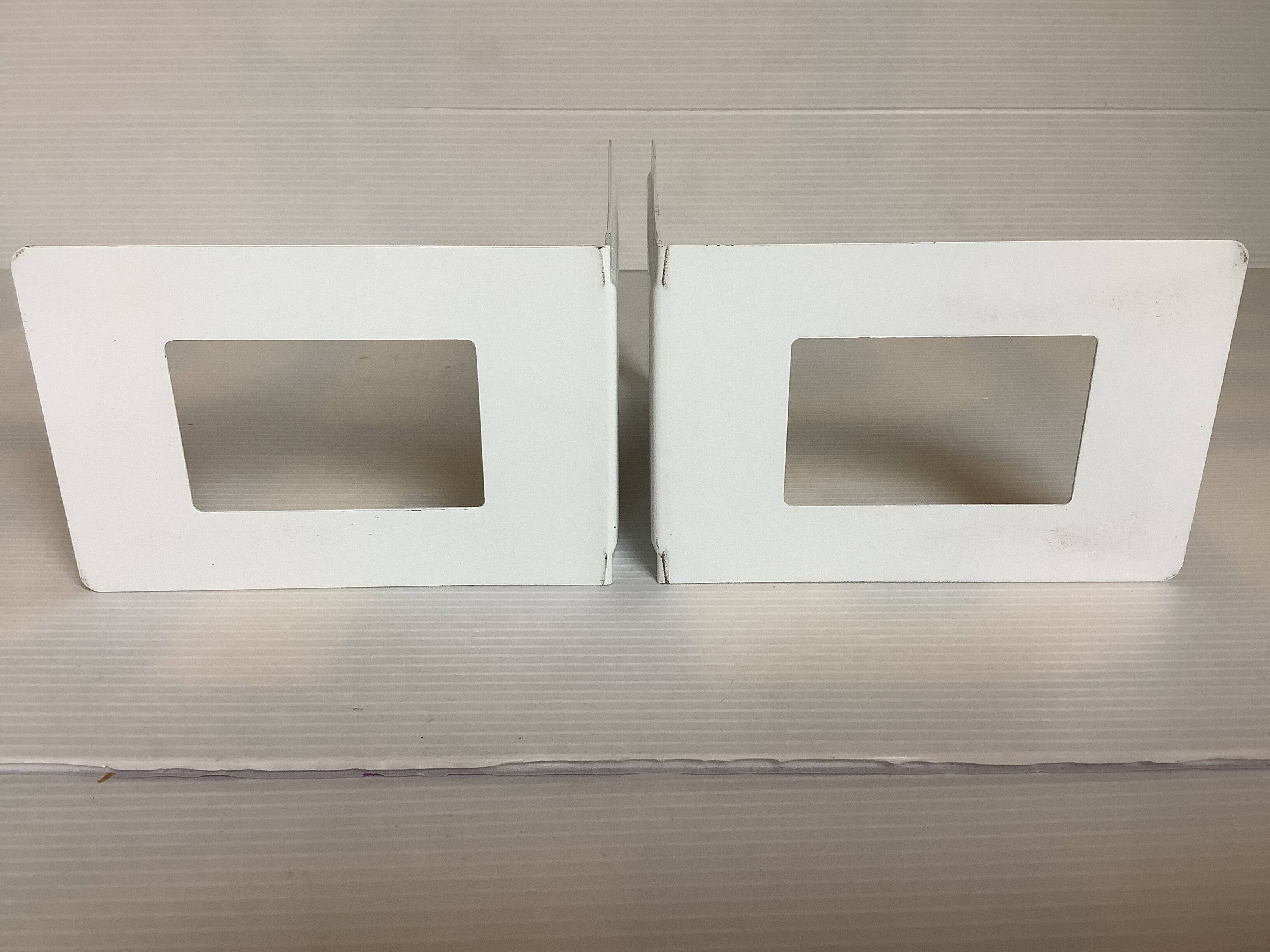 Pair of white metal bookends