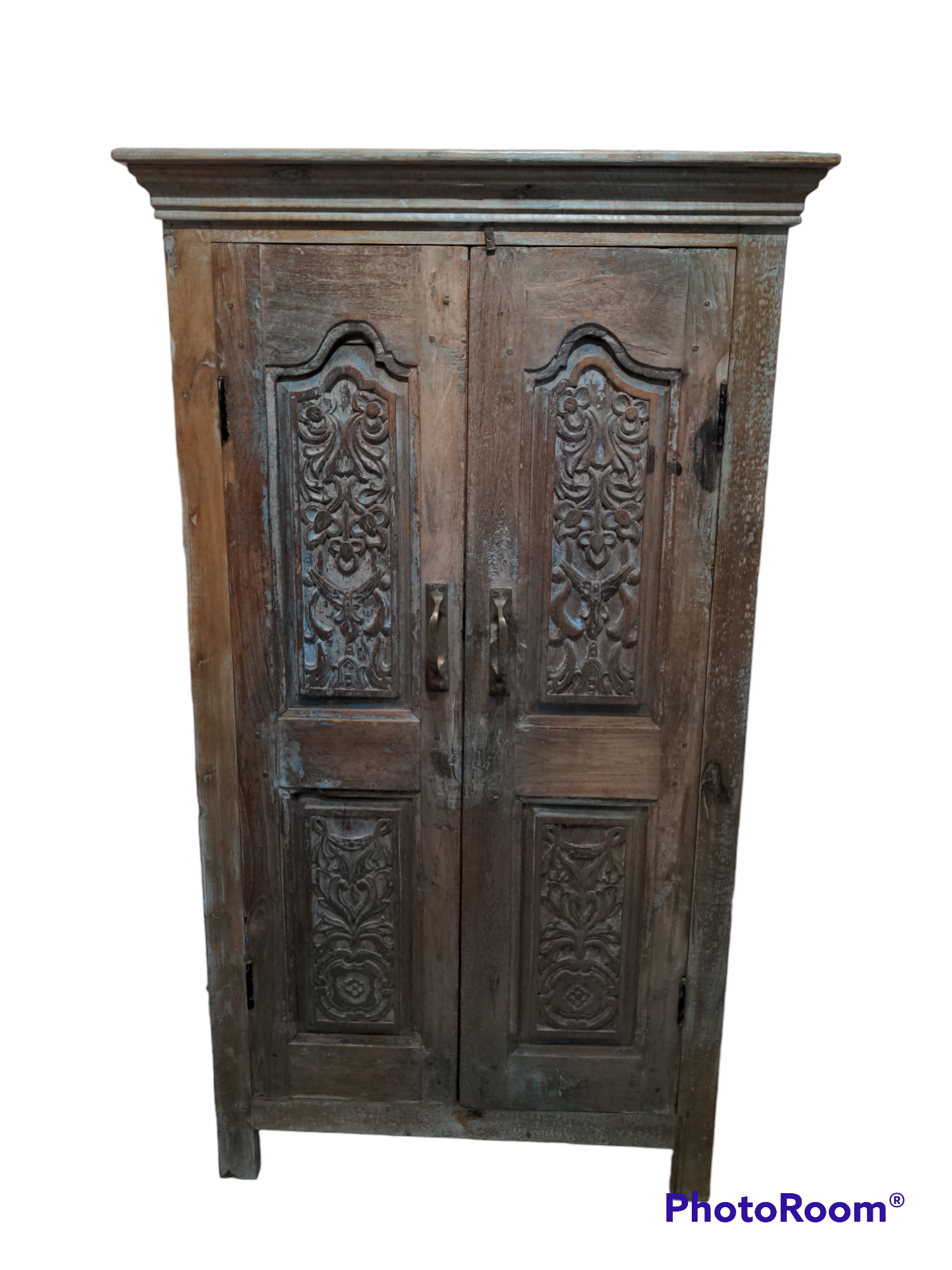 Carved teak cabinet
