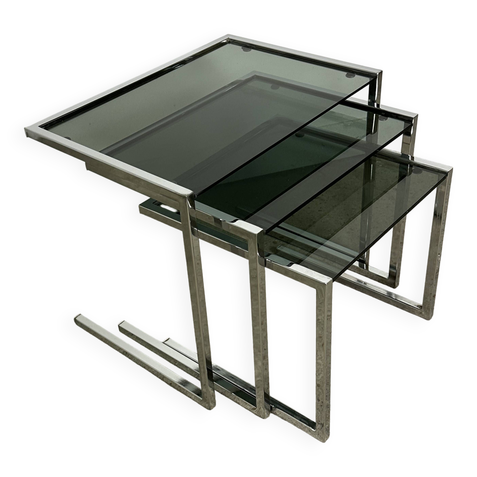 Nesting table in chrome metal and smoked glass 1980
