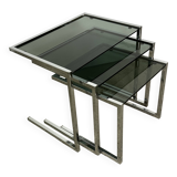 Nesting table in chrome metal and smoked glass 1980
