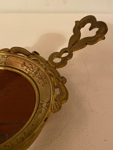 Hand-held rat tail in gilded brass and red marble