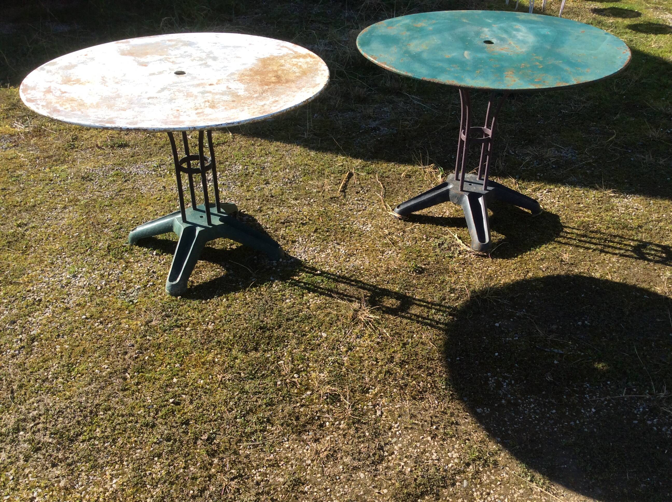 Two metal garden tables make up