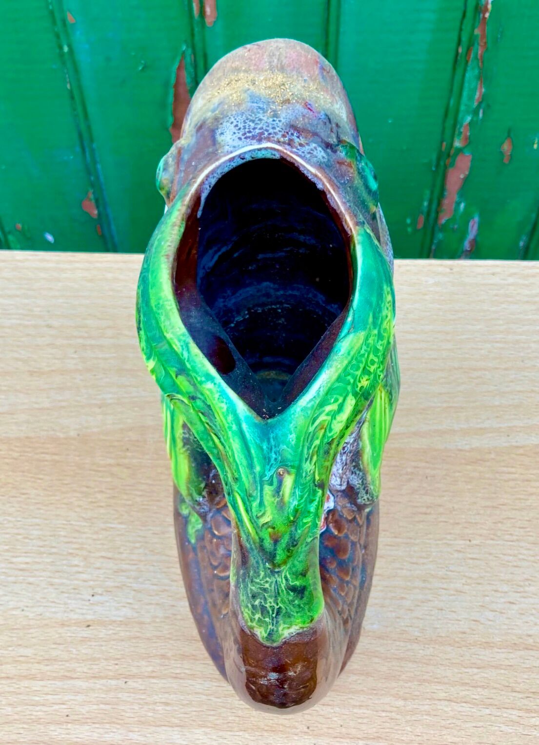Glazed ceramic pitcher, fish