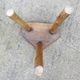 Farm stool in raw wooden sitting in the shape of a popular art