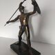 Large statue of Achilles, Greek warrior, marble base, ancient mythology.