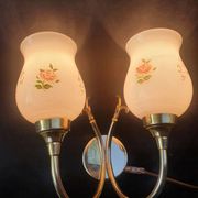 Pair of vintage wall sconces in gilded brass and pink opaline glass.
