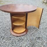 Vintage round oak coffee table with a door