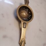 Art deco tea colander