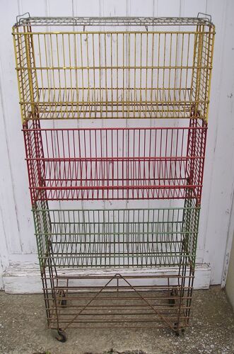 Metal display on wheels with 4 removable baskets 1960/70