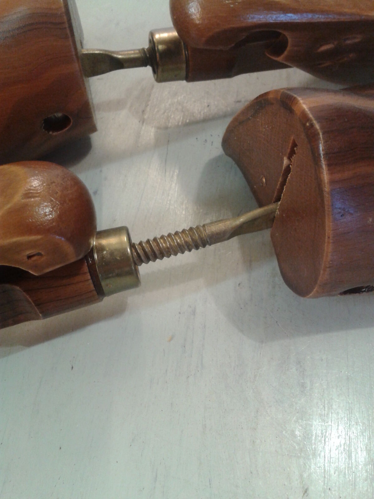 Pair wood and brass shoe