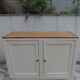 Vintage beige sideboard with oak top.