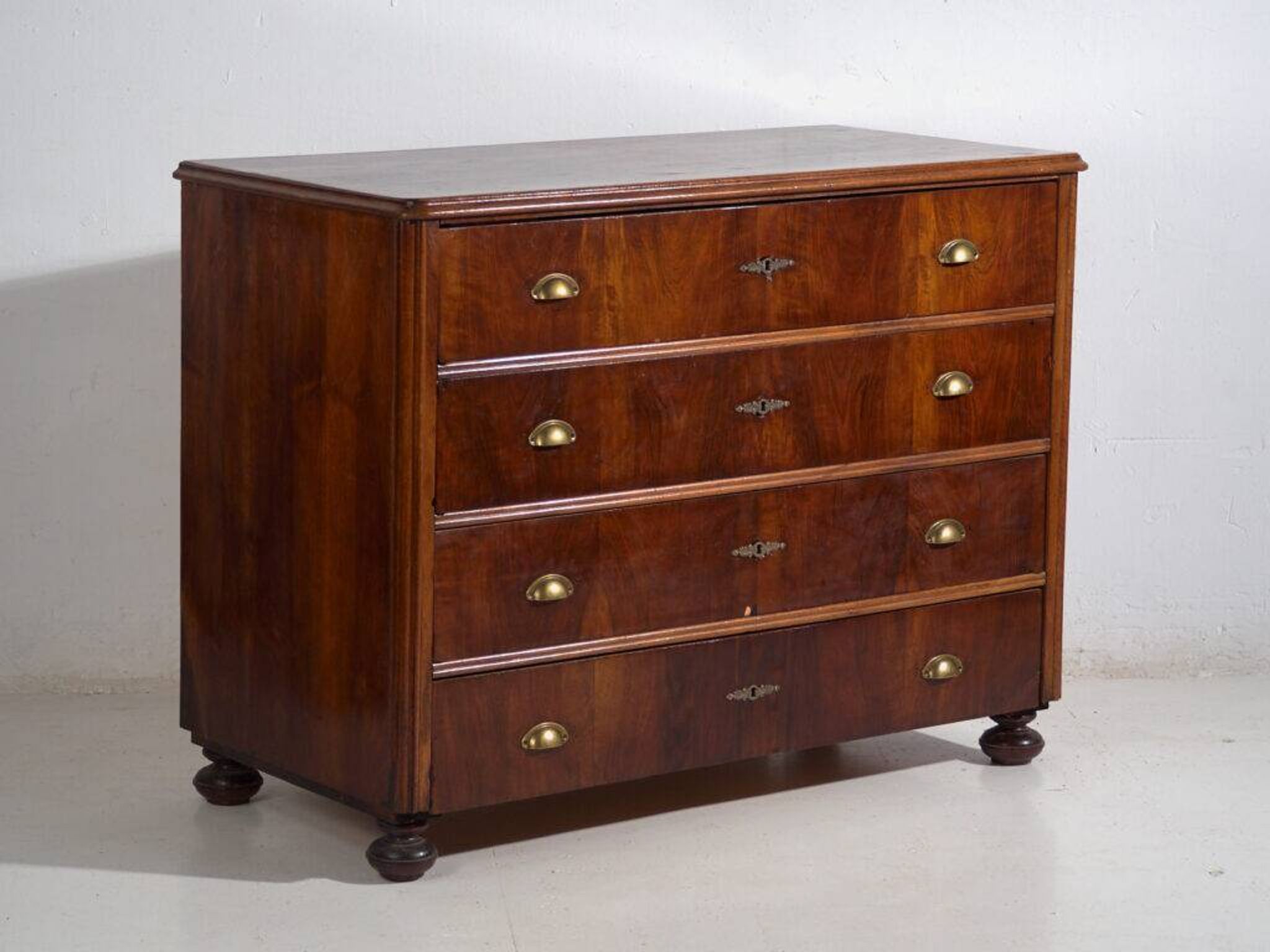 Antique pine chest of drawers with four drawers and brass handles – Central Europe, circa 1900