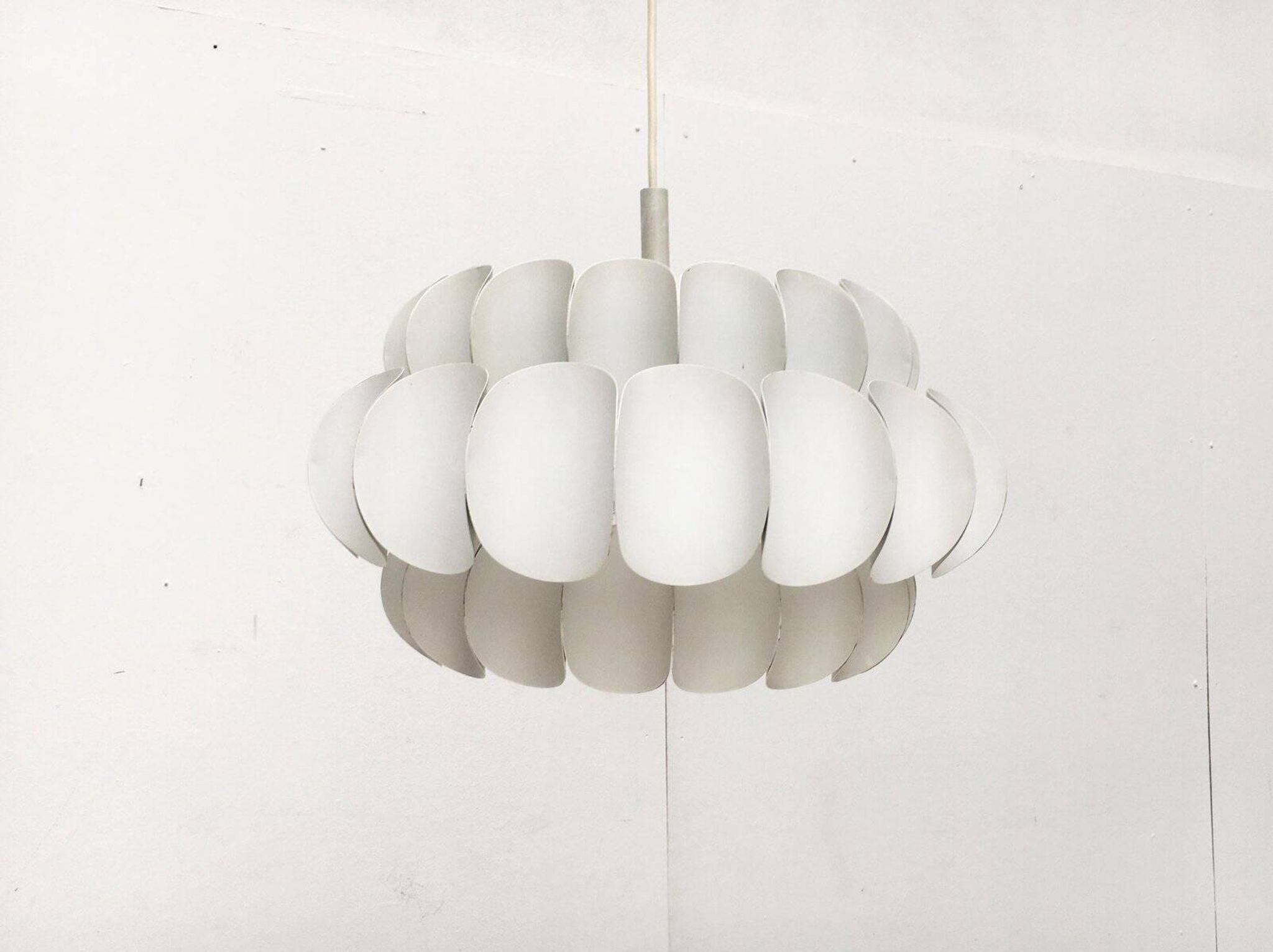 Mid-century white metal Swiss suspension by H. Zender for Temde.