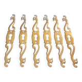 Patinated brass keyholes