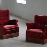 Pair of modern Danish lounge chairs, cherry red velvet, 1950s.