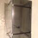 Table basse sur roulette 1970 chrome et verre fumé