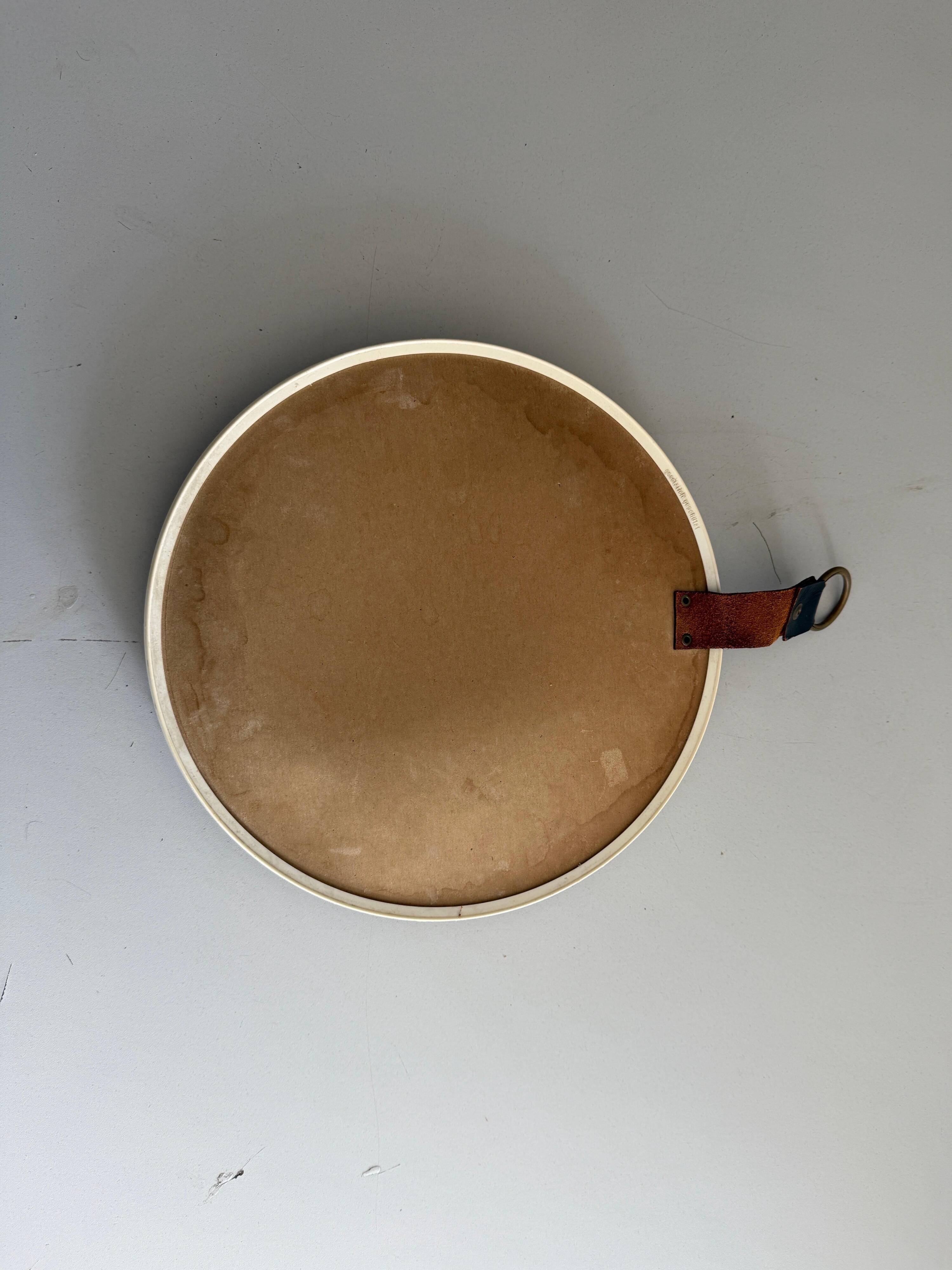 Round wall mirror with brass frame and leather hanger, 1960, Germany