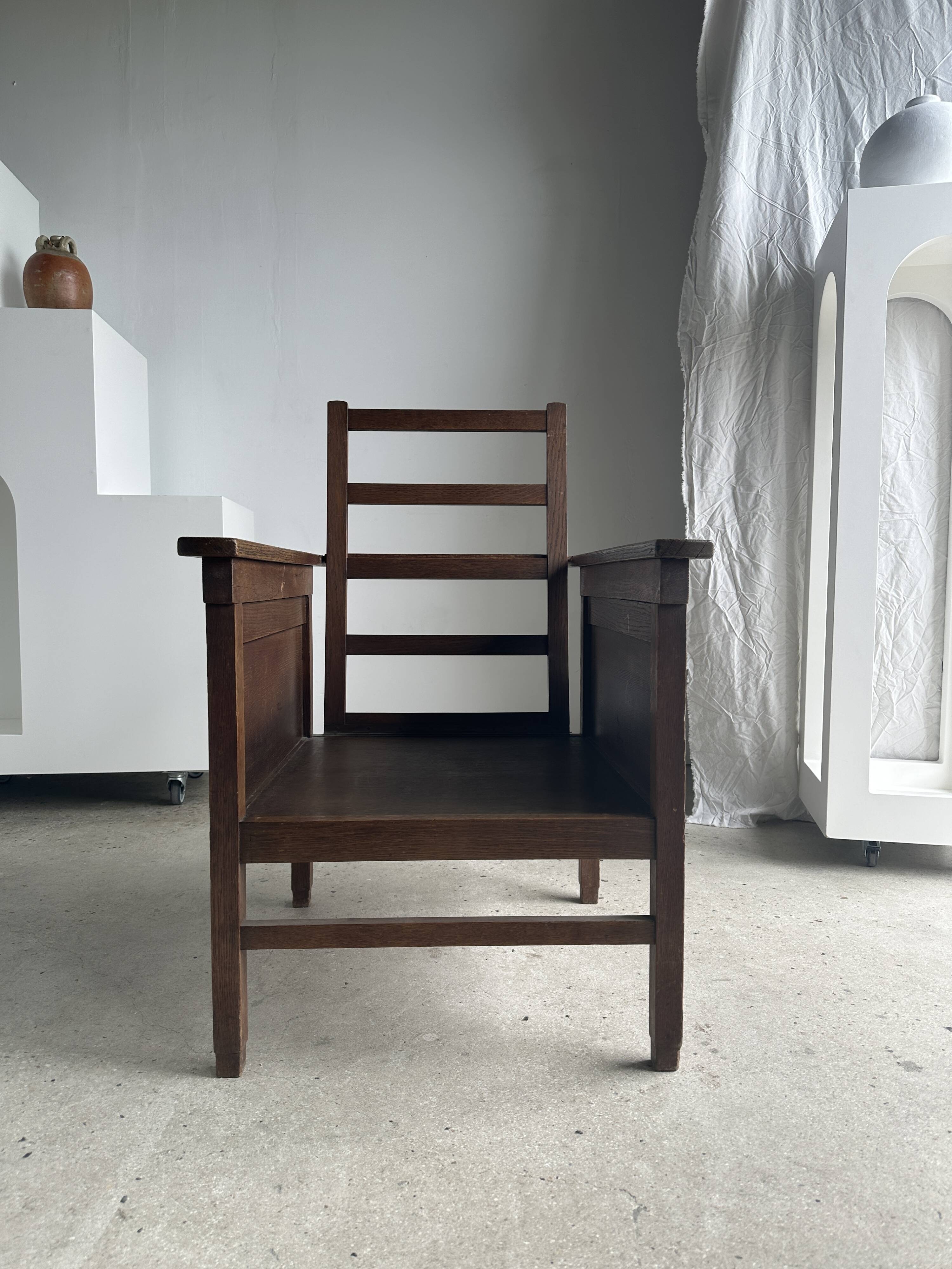 Large wooden armchair with adjustable reclining back