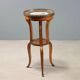 Antique walnut coffee table with painted ceramic insert, 20th century.