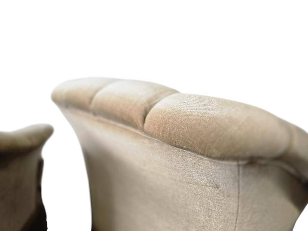 Set of 2 vintage ecru armchairs with fringes.