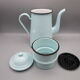 Old white enamelled coffee maker
