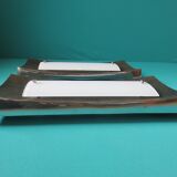 Pair of wall sconces in gold-plated alloy with bas-relief and opaline glass. Germany, 1980