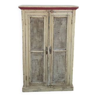 Old wooden pantry cabinet with mesh doors