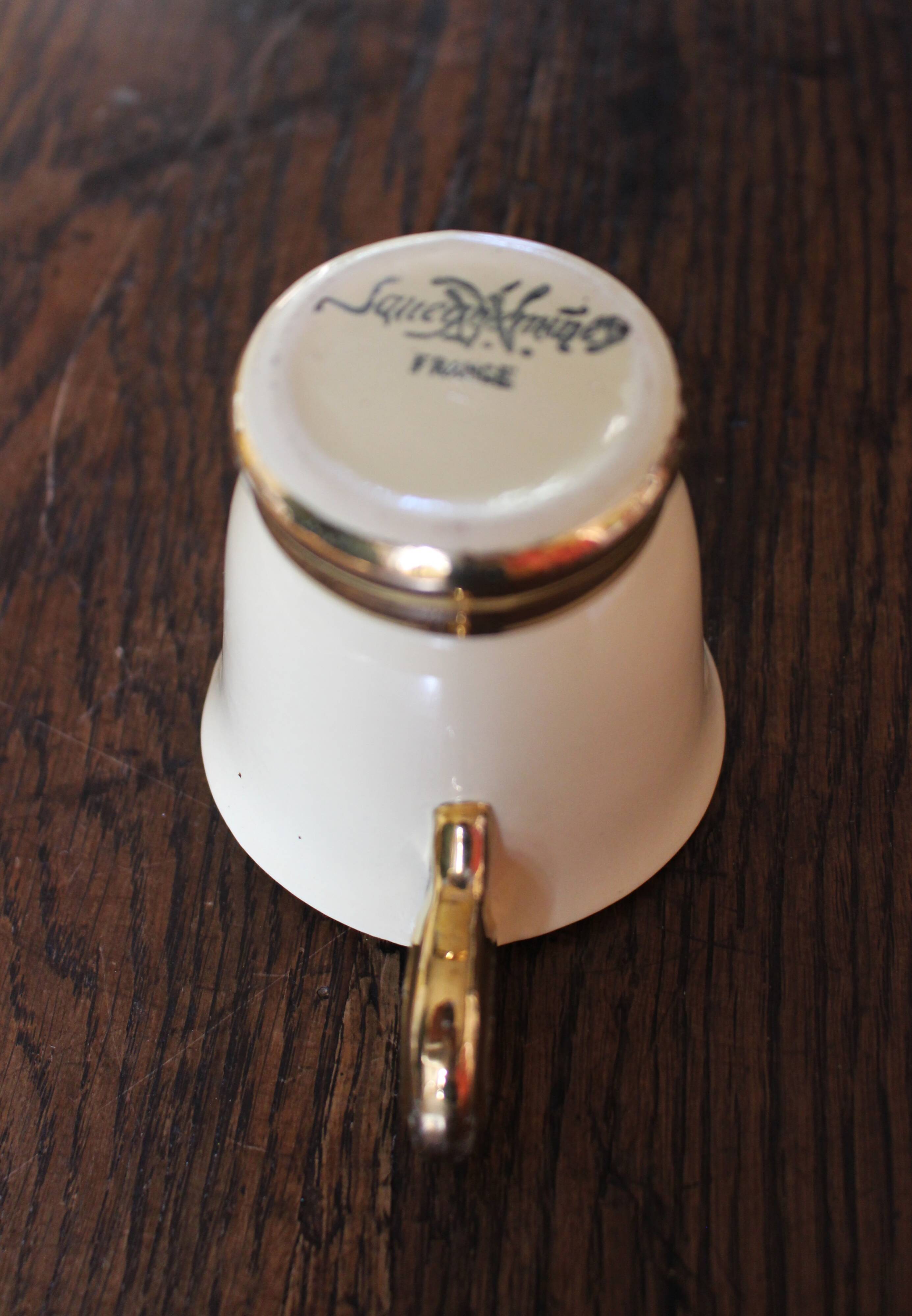 Ecru ceramic milk jug with gold decoration from Sarreguemines.