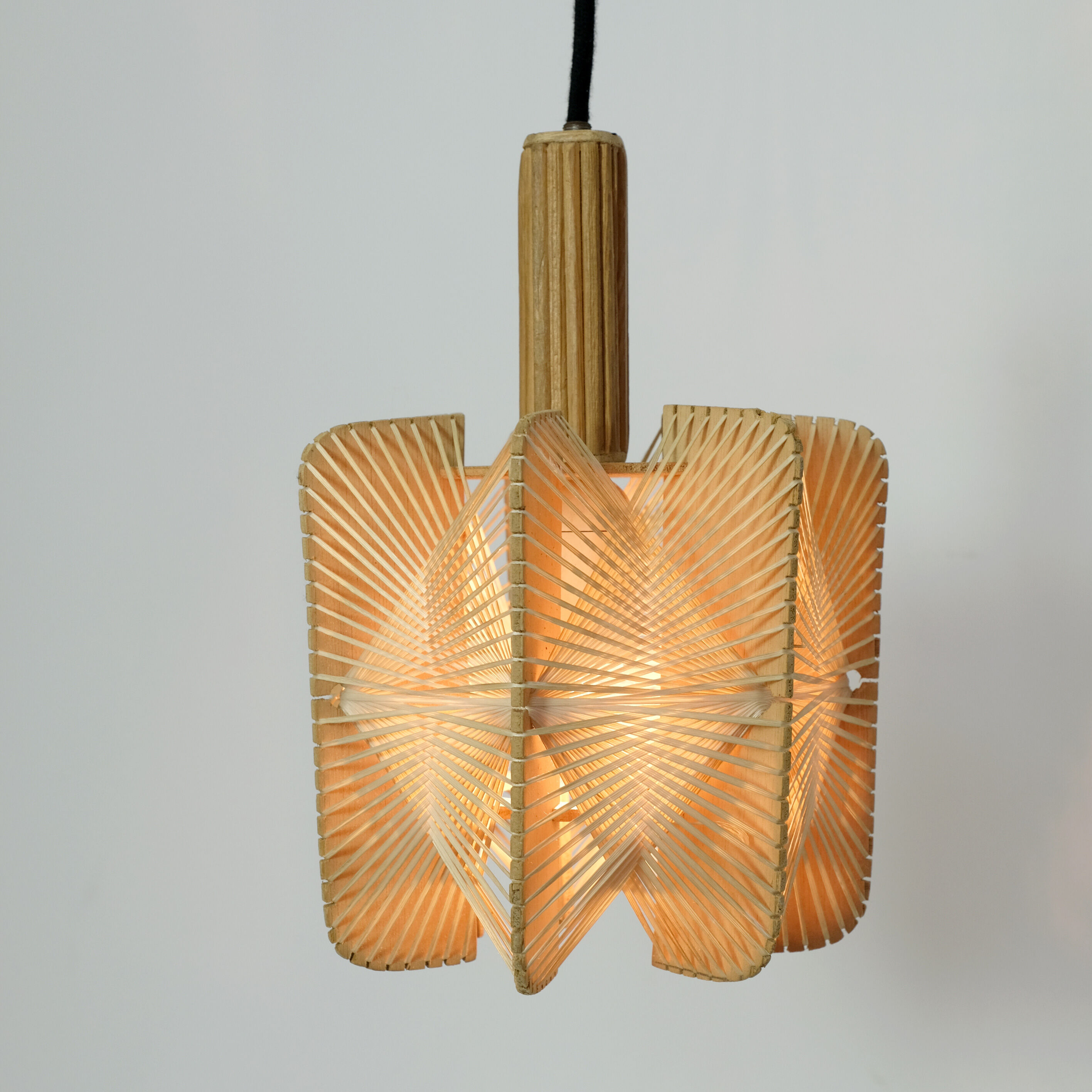 Hanging lamp in wood and threads of the 70