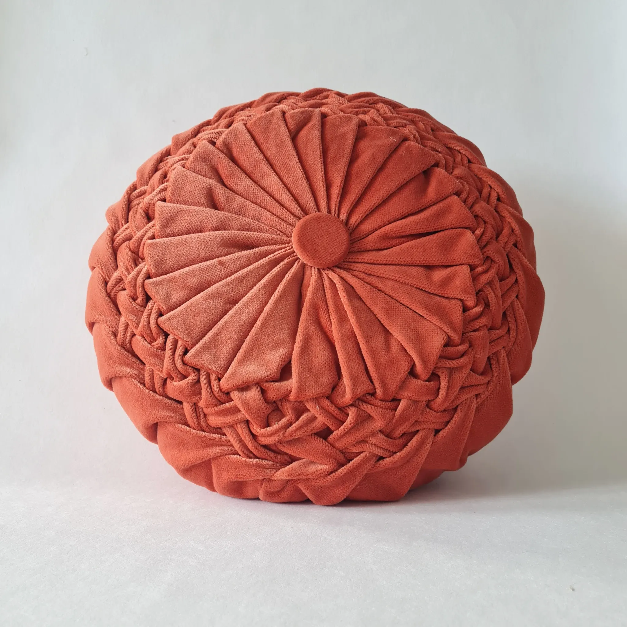Pleated terracotta red velvet cushion