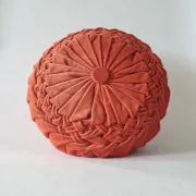 Pleated terracotta red velvet cushion
