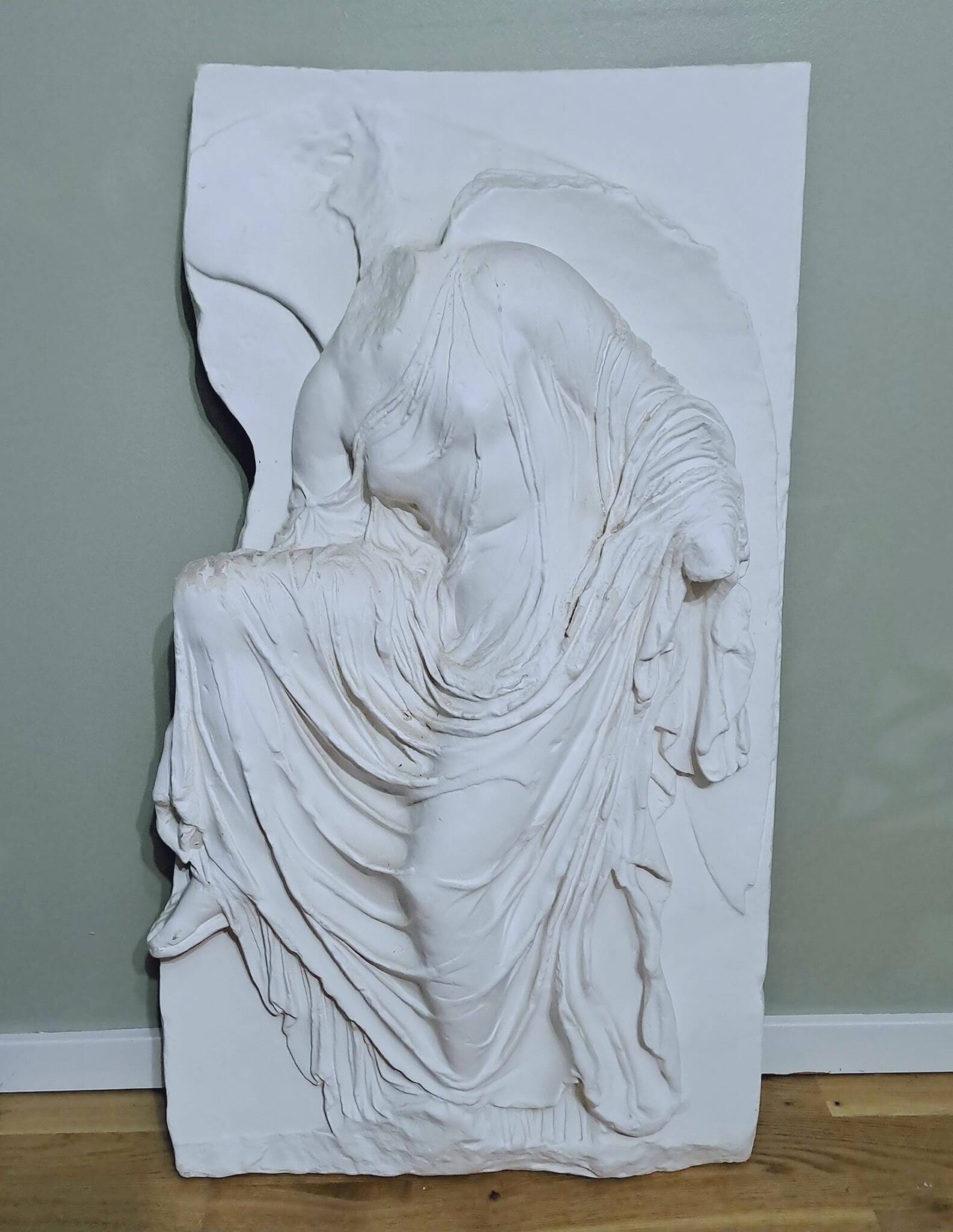 Plaster bas relief "Athena adjusting her sandal"