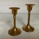 Pair of small brass tulip-shaped candlesticks