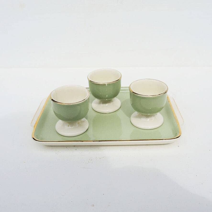 3 antique egg cups on a ceramic tray – Villeroy Boch