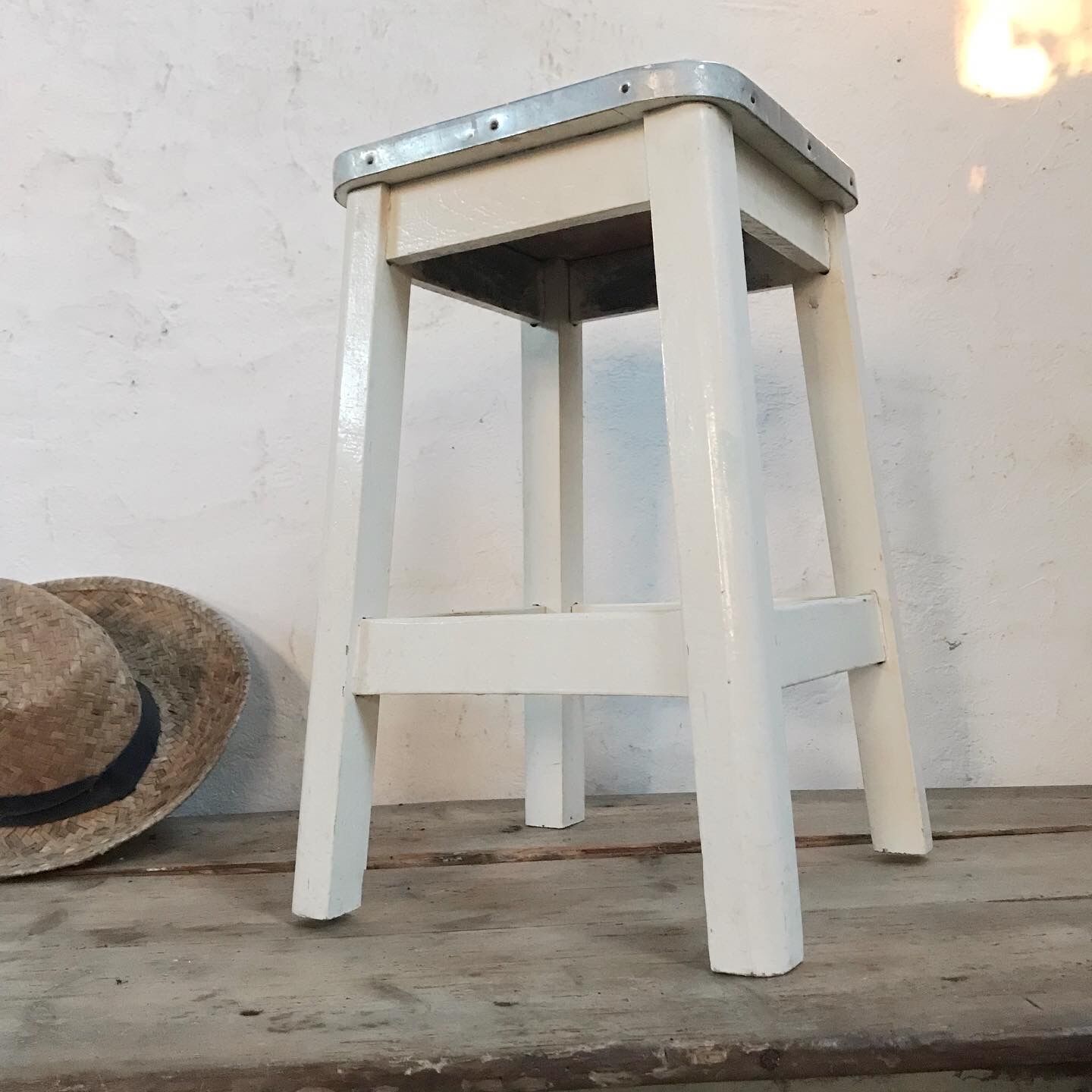 Antique wooden stool and formica