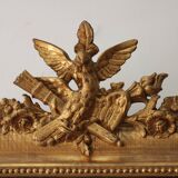 Old gilded mirror with A pediment