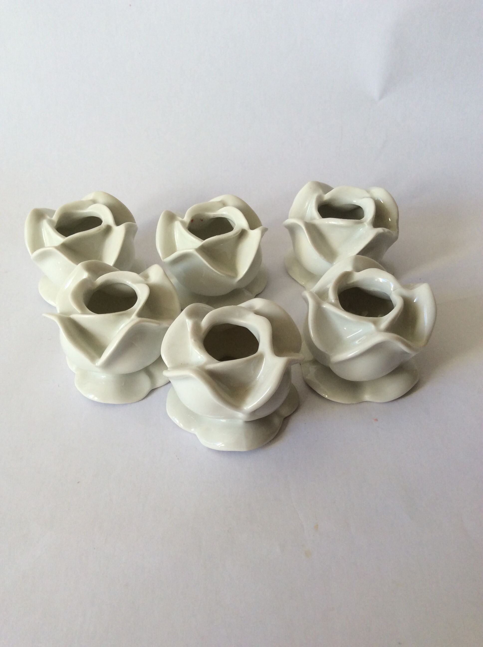 set of 6 pink candle holders in white porcelain
