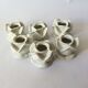 set of 6 pink candle holders in white porcelain